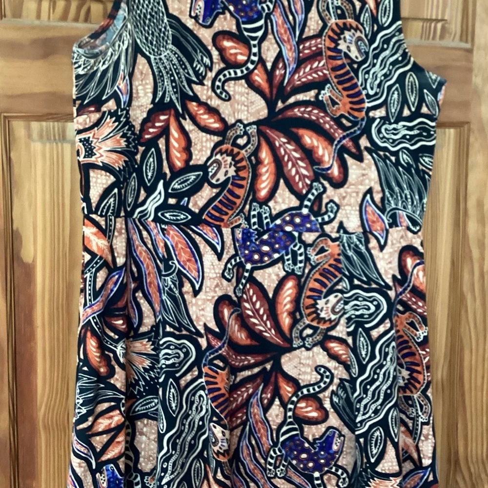 H&M summer dress with peek a boo back! Very cute and flirty!